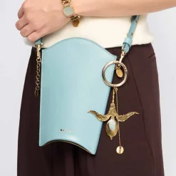 Artystyczny brelok z ceramiką w kształcie kwiatu irysa z kolekcji Monumental