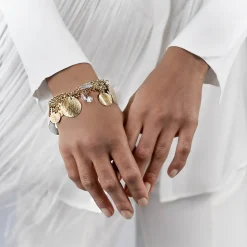 Bransoletka na łańcuchu ze złoto-srebrnymi zawieszkami i kryształami z kolekcji Rundo