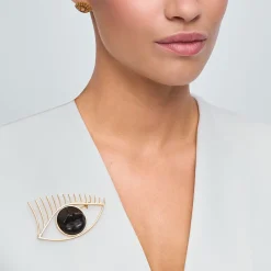 Broszka z rzeźbionymi w drewnie ustami z kolekcji Kembali