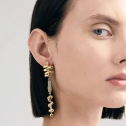 Długie, pozłacane kolczyki z meteorytem z kolekcji Meteoros