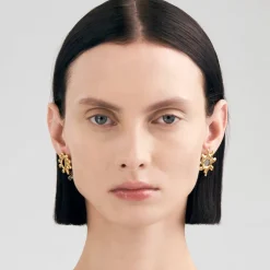 Gwiaździste, pozłacane kolczyki z meteorytem z kolekcji Meteoros