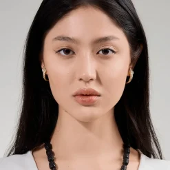 Kolczyki koła z wężowym motywem z kolekcji Kembali