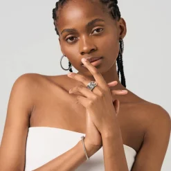 Szeroka srebrna obrączka z ażurowym wzorem i ametystem z kolekcji Duo