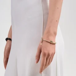 Sztywna, pozłacana bransoletka z wężem z kolekcji Kembali