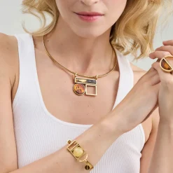 Sztywna, pozłacana kolia z bursztynami z kolekcji Baltica