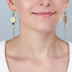 Złote wiszące kolczyki z kryształami z kolekcji Soda